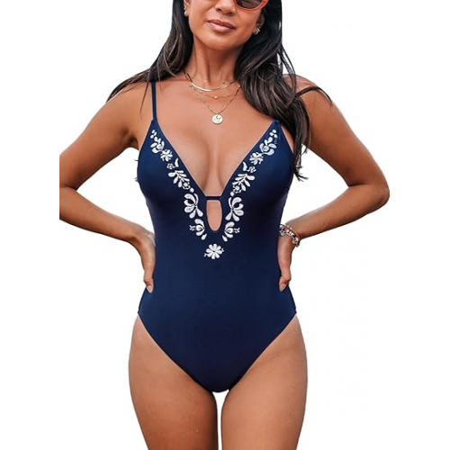 Слитный купальник с вышивкой и глубоким вырезом