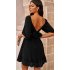 Черное плиссированное мини-платье с открытой спиной и бантом