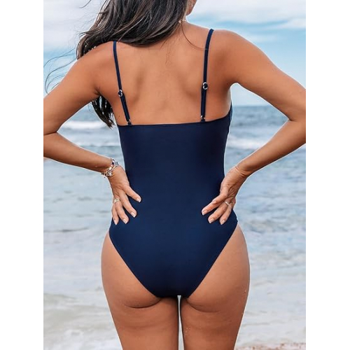 Слитный купальник с вышивкой и глубоким вырезом