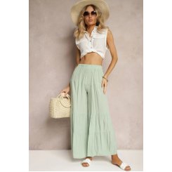 Нежно-зеленые брюки палаццо с воланами и резинкой на поясе